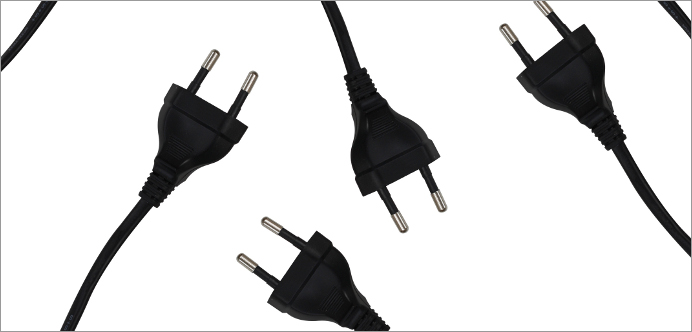 Black european power cords isolated on white 한국은 제조업과 납사 사용 비중이 높은 산업 구조로 비효율적인 전력소모가 많습니다