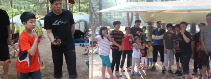 가족 솔방울던지기 게임을 통해 아이들은 금세 친구가 되었습니다. C-: